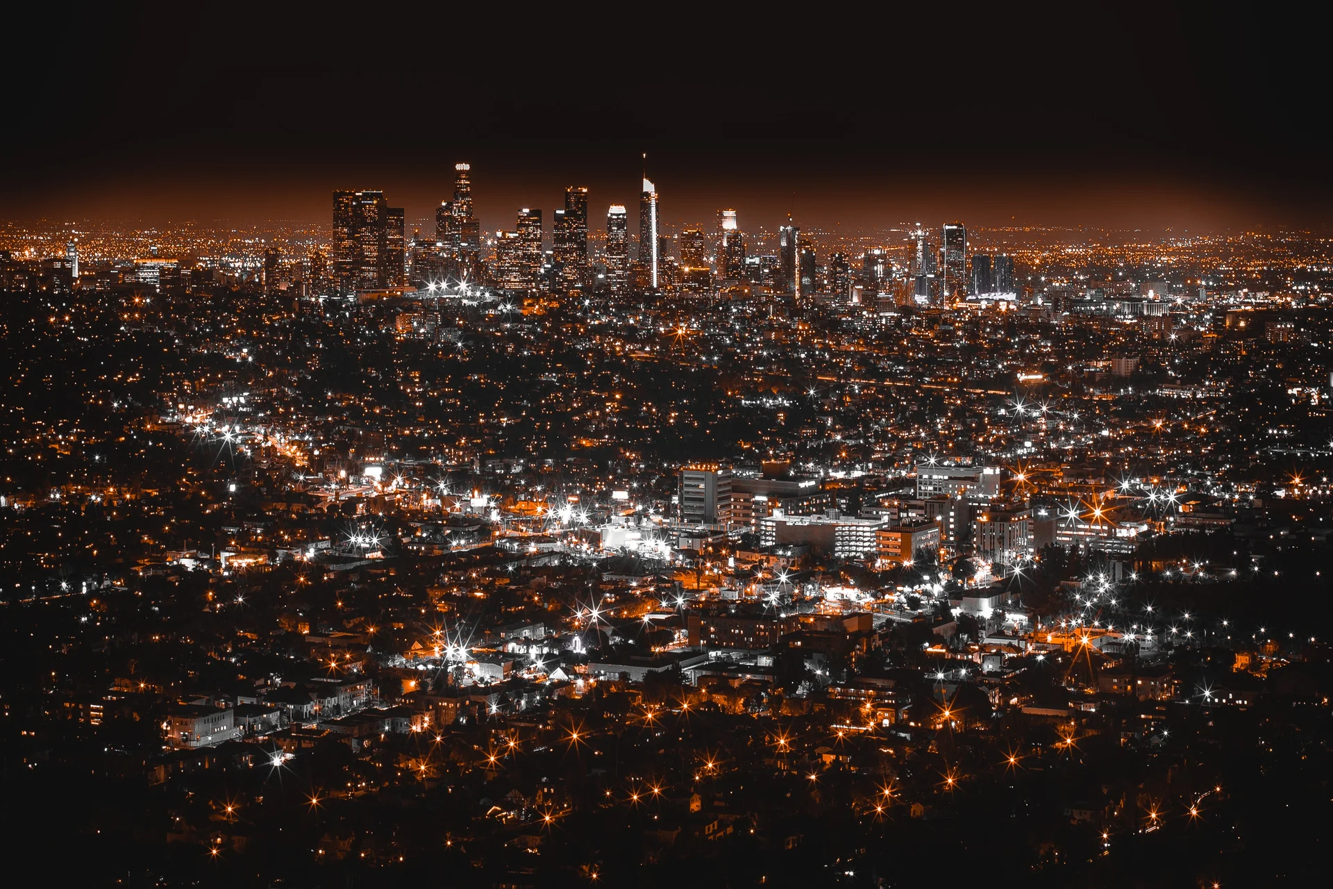 Luxury chauffeur service in Los Angeles providing executive transportation with premium vehicles and professional drivers against iconic LA skyline from Beverly Hills to Downtown LA